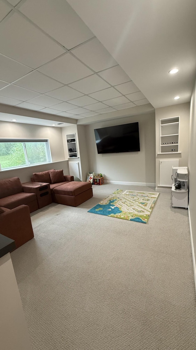 1932 Buehler Rd, Hastings, MI 49058 - living area with carpet floors and a paneled ceiling