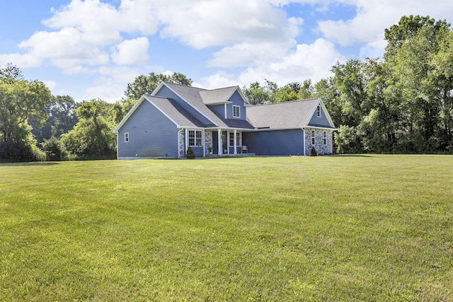 9430 Island Lake Rd, Dexter, MI 48130 - view of front facade with a front lawn and stone siding
