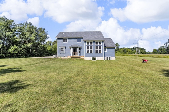 9430 Island Lake Rd, Dexter, MI 48130 - rear view of house with a lawn