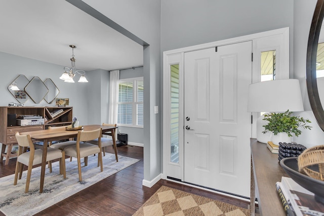 9430 Island Lake Rd, Dexter, MI 48130 - entrance foyer featuring dark wood-type flooring and a chandelier