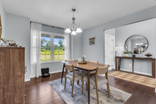 9430 Island Lake Rd, Dexter, MI 48130 - dining area featuring a chandelier and hardwood / wood-style floors