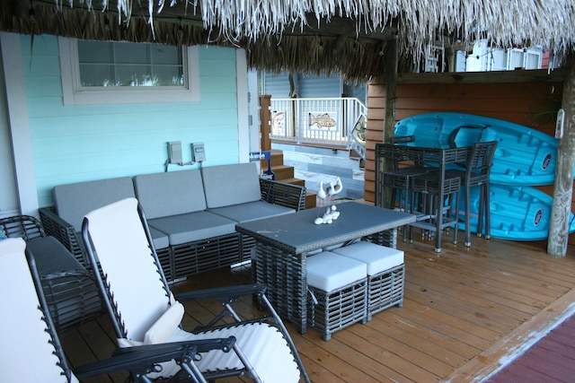 999 Morris Ave Unit 4-4, Key Largo, FL 33037 - wooden deck with an outdoor hangout area