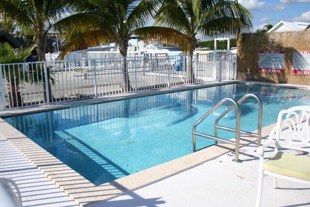 999 Morris Ave Unit 4-4, Key Largo, FL 33037 - view of swimming pool featuring a patio area