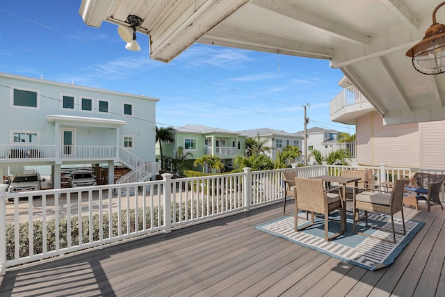 699 116th St, Ocean, Marathon, FL 33050 - wooden deck with outdoor dining space and a residential view