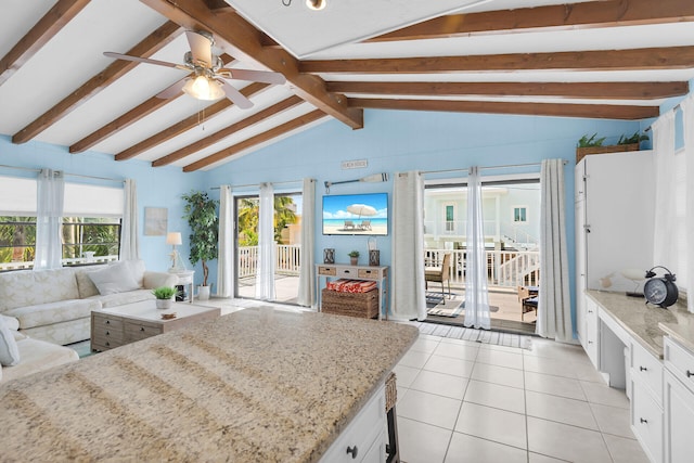 699 116th St, Ocean, Marathon, FL 33050 - living area featuring light tile patterned floors, lofted ceiling with beams, and a ceiling fan