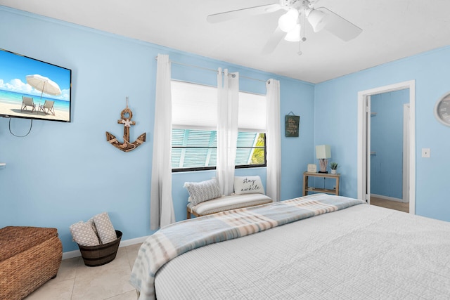 699 116th St, Ocean, Marathon, FL 33050 - tiled bedroom with a ceiling fan and baseboards
