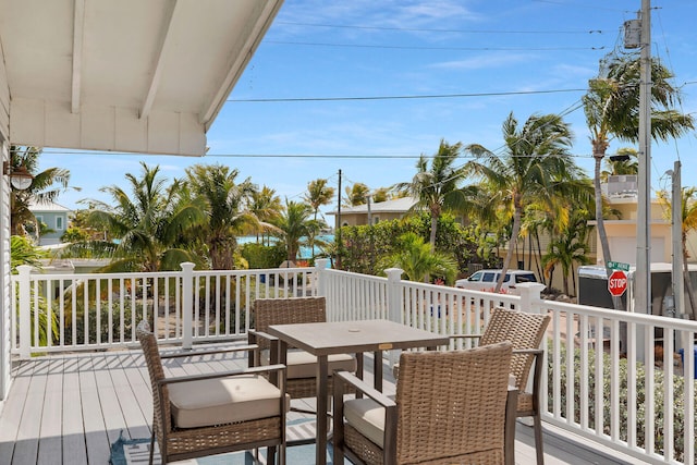 699 116th St, Ocean, Marathon, FL 33050 - wooden terrace with outdoor dining area