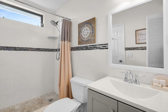 699 116th St, Ocean, Marathon, FL 33050 - bathroom featuring tile walls, toilet, a tile shower, and vanity
