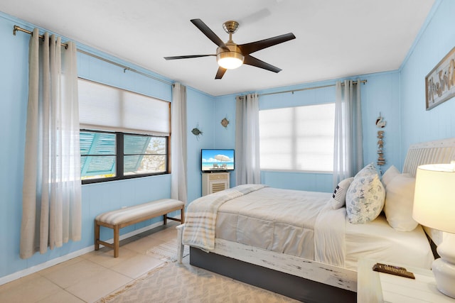 699 116th St, Ocean, Marathon, FL 33050 - bedroom with light tile patterned floors, a ceiling fan, and multiple windows