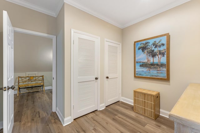 81250 Overseas Hwy Unit 1, Islamorada, FL 33036 - hallway featuring wood finished floors and ornamental molding