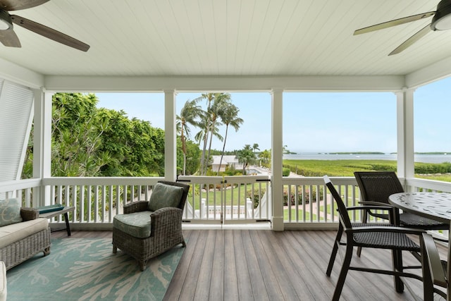 81250 Overseas Hwy Unit 1, Islamorada, FL 33036 - sunroom / solarium featuring a ceiling fan and a water view