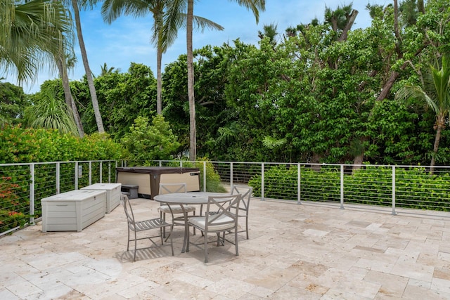 81250 Overseas Hwy Unit 1, Islamorada, FL 33036 - view of patio / terrace with a hot tub and outdoor dining space