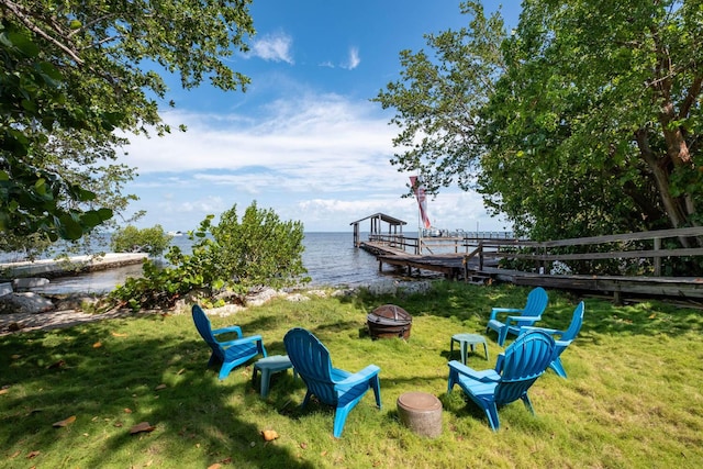 87950 Overseas Hwy, Islamorada, FL 33036 - view of grassy yard with a fire pit and a water view