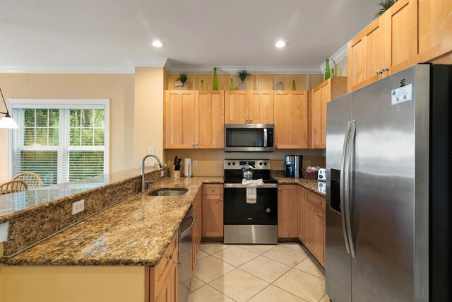 2600 Overseas Hwy Unit 87, Marathon, FL 33050 - kitchen with sink, crown molding, appliances with stainless steel finishes, kitchen peninsula, and light stone countertops