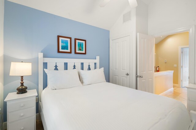2600 Overseas Hwy Unit 87, Marathon, FL 33050 - bedroom with light tile patterned flooring, lofted ceiling, and a closet