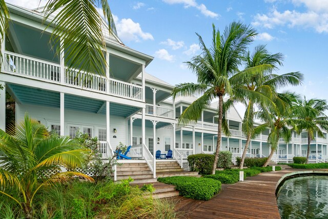 2600 Overseas Hwy Unit 87, Marathon, FL 33050 - tiled living room featuring french doors, ceiling fan, and ornamental molding