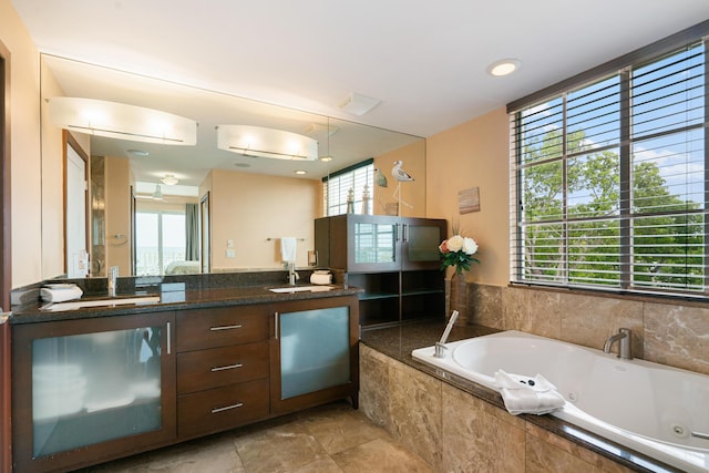 97501 Overseas Hwy Unit 131, Key Largo, FL 33037 - bathroom with double vanity and a whirlpool tub