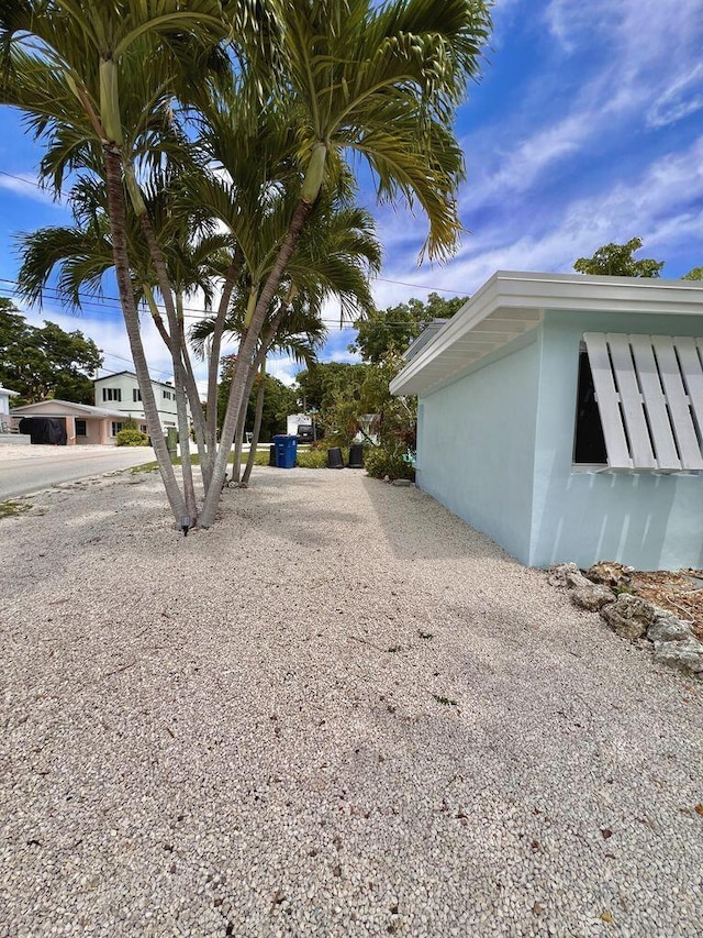 40 Pirates Dr, Key Largo, FL 33037 - view of property exterior with stucco siding