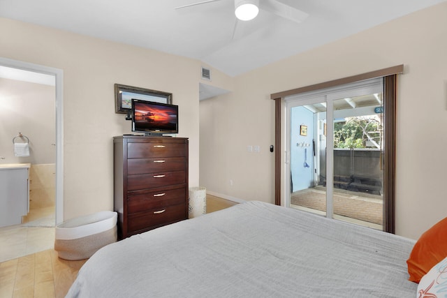 bedroom with a ceiling fan, lofted ceiling, ensuite bathroom, visible vents, and access to outside
