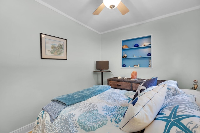 bedroom featuring a ceiling fan, ornamental molding, and baseboards