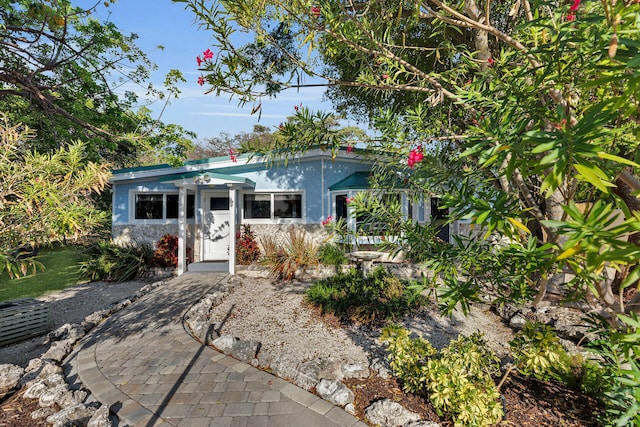 view of front of home featuring stucco siding