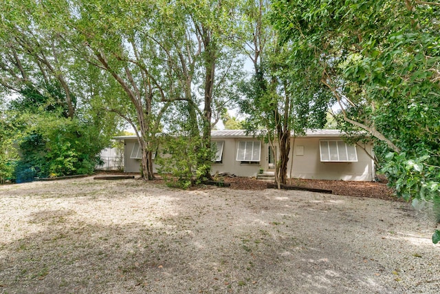 230 Apache St, Tavernier, FL 33070 - view of front of house featuring a metal roof