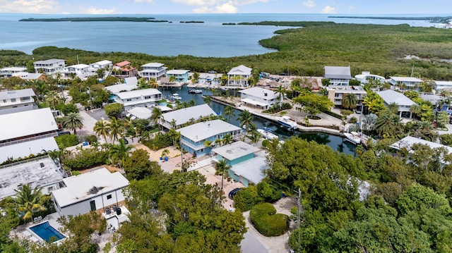 230 Apache St, Tavernier, FL 33070 - aerial view of property's location featuring a large body of water and nearby suburban area