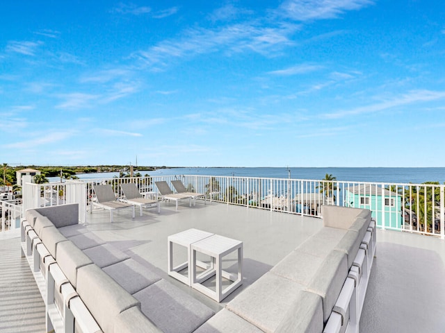 view of patio featuring an outdoor living space and a water view