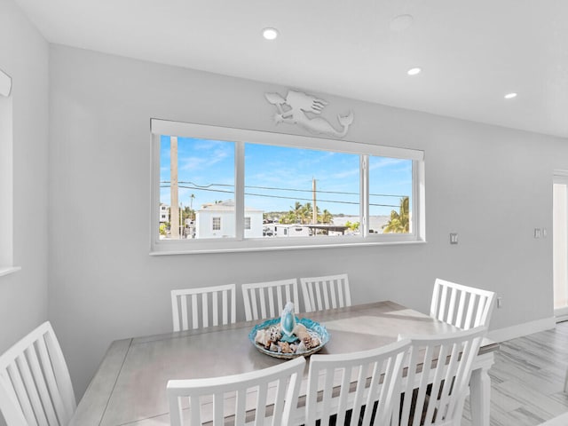 dining room with light hardwood / wood-style floors