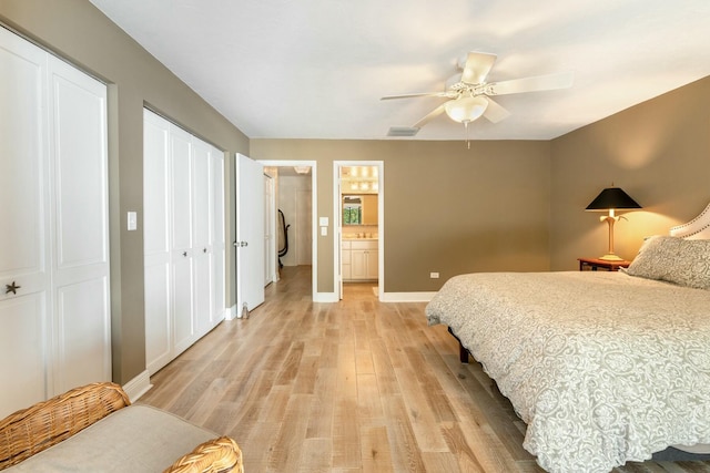 bedroom with visible vents, a ceiling fan, connected bathroom, light wood-style floors, and baseboards