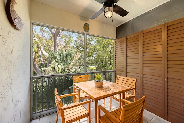 98202 Windward Ave, Key Largo, FL 33037 - sunroom featuring ceiling fan and outdoor dining area