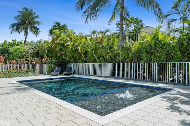view of swimming pool featuring a patio
