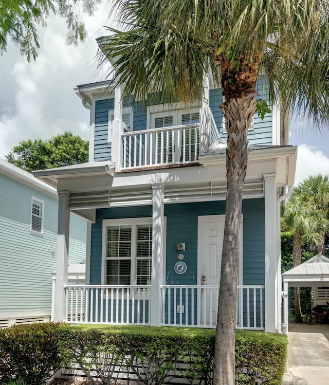 view of front of property with a balcony