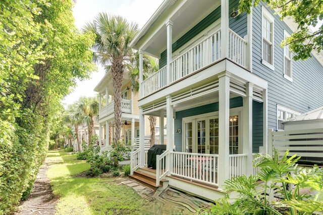 view of home's exterior with a balcony