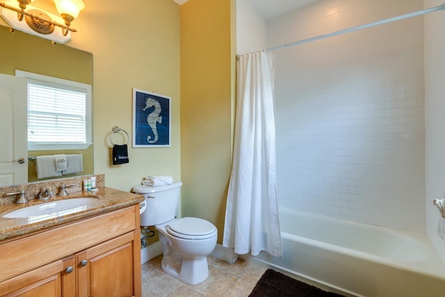 full bathroom featuring tile patterned floors, toilet, vanity, and shower / bath combo