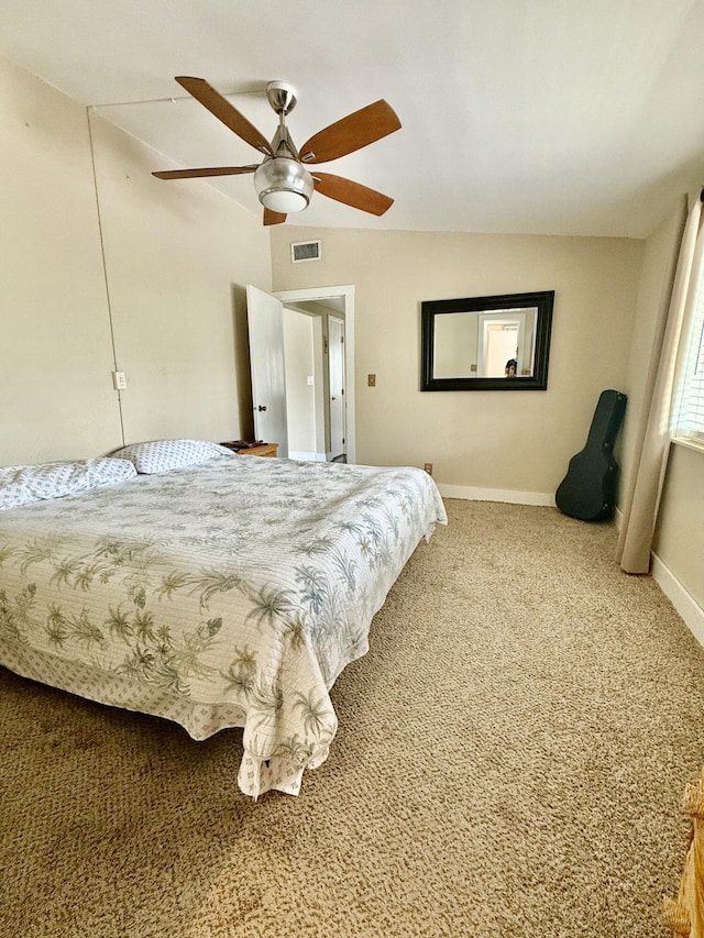 carpeted bedroom featuring lofted ceiling and ceiling fan