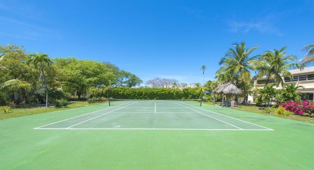view of tennis court featuring a gazebo