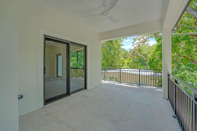 793 Oceana Ave, Key Largo, FL 33037 - balcony featuring a ceiling fan and view of scattered trees