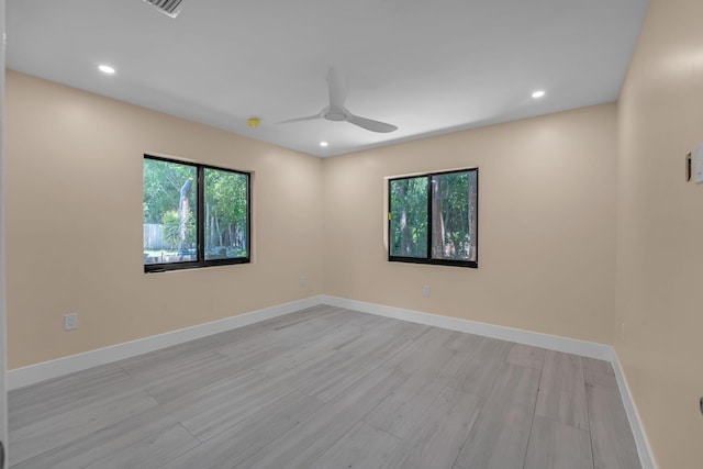 793 Oceana Ave, Key Largo, FL 33037 - unfurnished room with a ceiling fan, light wood finished floors, and recessed lighting