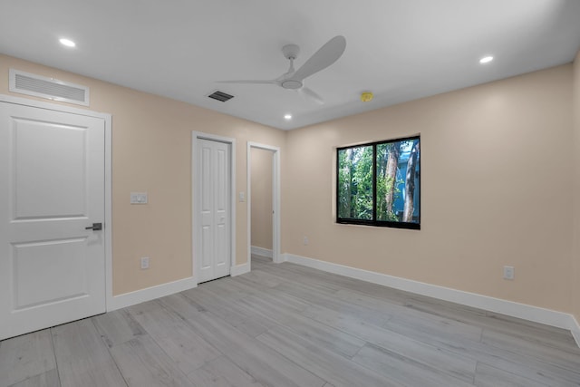 793 Oceana Ave, Key Largo, FL 33037 - unfurnished bedroom with light wood-style flooring, recessed lighting, a closet, and a ceiling fan