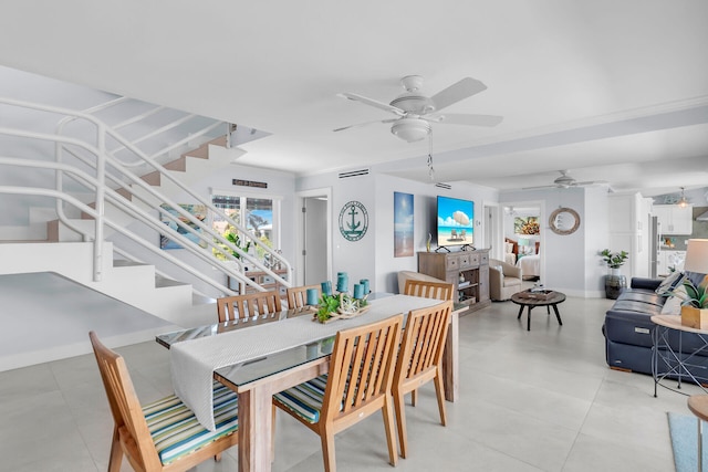 dining area with ceiling fan