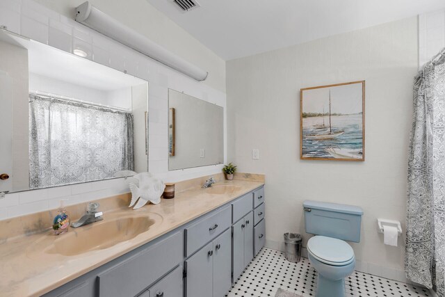 1519 Johnson St, Key West, FL 33040 - bathroom featuring vanity and toilet