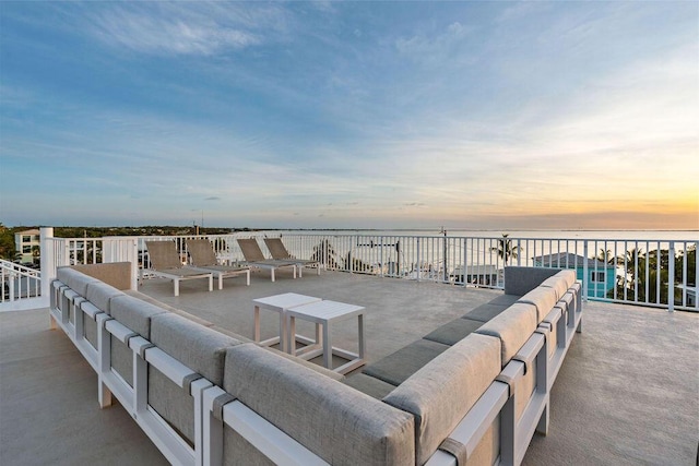 view of patio / terrace featuring outdoor lounge area and a water view