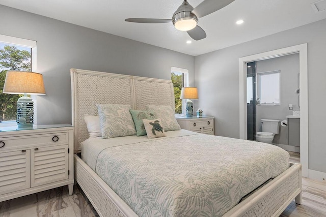 bedroom featuring connected bathroom, recessed lighting, and a ceiling fan