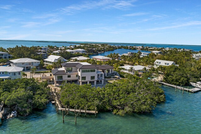 25 Mutiny Pl, Key Largo, FL 33037 - aerial view of residential area with a nearby body of water