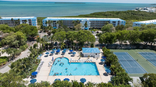 birds eye view of property featuring a water view