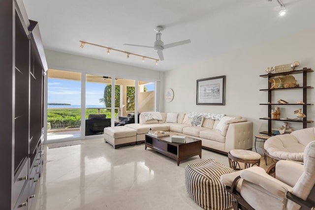 living room featuring track lighting and ceiling fan