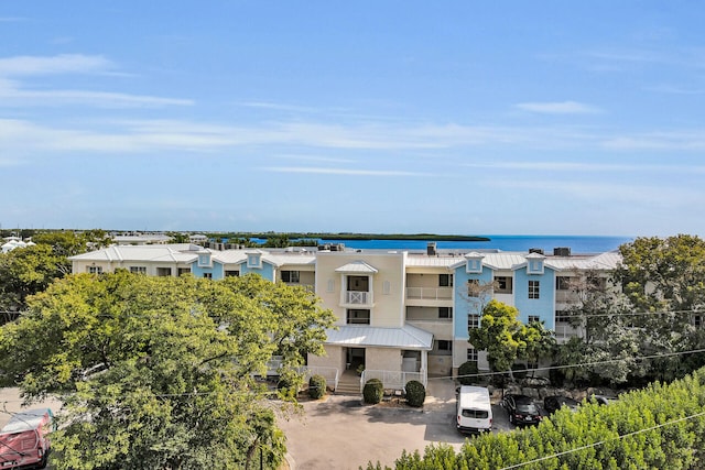 exterior space with a water view