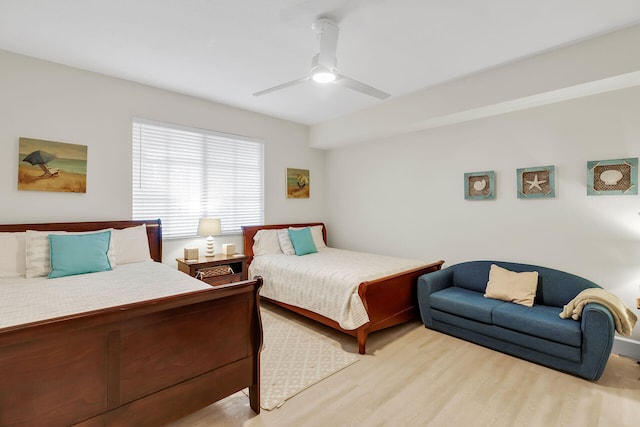 bedroom featuring ceiling fan and light wood-type flooring