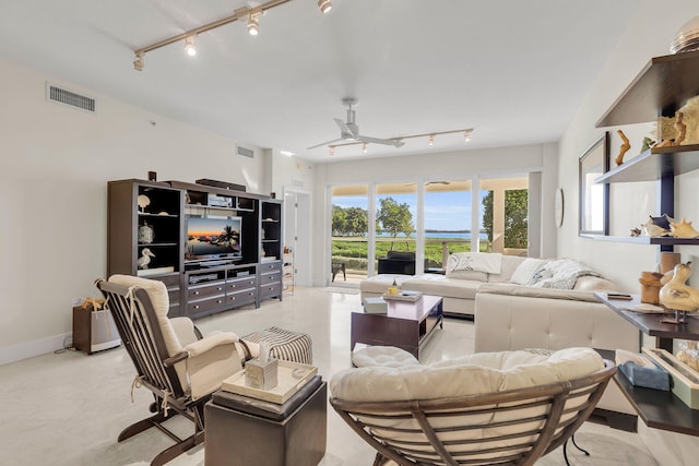 living room featuring ceiling fan